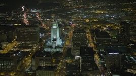 5K aerial stock footage of passing Los Angeles City Hall, Downtown Los Angeles, California, night Aerial Stock Footage | AX64_0384E