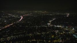 5K aerial stock footage of 101 freeway and urban neighborhoods in Echo Park, Los Angeles, California, night Aerial Stock Footage | AX64_0415E