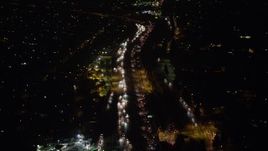 5K aerial stock footage of following traffic on Interstate 5 freeway, Sun Valley, California, night Aerial Stock Footage | AX64_0434