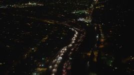 5K aerial stock footage of freeway traffic traveling on Interstate 5, Sun Valley, California night Aerial Stock Footage | AX64_0435
