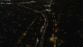 5K aerial stock footage of freeway traffic on Interstate 5 through Sun Valley, California night Aerial Stock Footage | AX64_0436