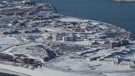 4.8K aerial stock footage of prison buildings on Rikers Island in snow New York Aerial Stock Footage | AX66_0048