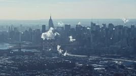 4.8K aerial stock footage of smoke stacks and skyscrapers in Midtown Manhattan, New York Aerial Stock Footage | AX66_0051