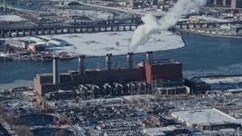 4.8K aerial stock footage of a power plant in winter in Queens, New York Aerial Stock Footage | AX66_0052