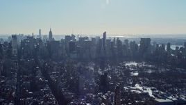 4.8K aerial stock footage of Midtown Manhattan's towering skyscrapers during winter, New York City Aerial Stock Footage | AX66_0058