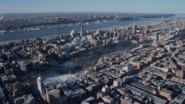 4.8K aerial stock footage tilt from Central Park to reveal Columbia University with snow, New York City Aerial Stock Footage | AX66_0059E