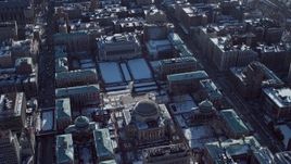 4.8K aerial stock footage orbit around the Columbia University campus with snow, New York City Aerial Stock Footage | AX66_0076E