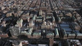 4.8K aerial stock footage of orbiting the snowy campus of Columbia University, Morningside Heights, New York City Aerial Stock Footage | AX66_0082