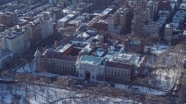 4.8K aerial stock footage of Museum of Natural History with snow, New York City Aerial Stock Footage | AX66_0106