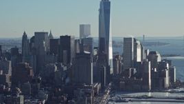 4.8K aerial stock footage tilt from Lincoln Highway to reveal One World Trade Center, New York City Aerial Stock Footage | AX66_0116