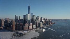 4.8K aerial stock footage of passing the World Trade Center and skyscrapers, Lower Manhattan, New York City Aerial Stock Footage | AX66_0121