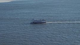 4.8K aerial stock footage of tracking a ferry in New York Harbor, New York Aerial Stock Footage | AX66_0124