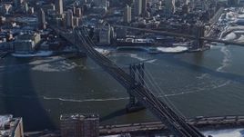 4.8K aerial stock footage tilt up the Manhattan Bridge, New York City Aerial Stock Footage | AX66_0143