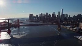 4.8K aerial stock footage of the Manhattan Bridge and Lower Manhattan skyline, New York City Aerial Stock Footage | AX66_0145E