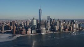 4.8K aerial stock footage approach World Trade Center and skyscrapers from the river, New York City Aerial Stock Footage | AX66_0169E
