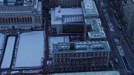4.8K aerial stock footage tilt from Midtown skyline, reveal Columbia University in winter, New York City, twilight Aerial Stock Footage | AX66_0287E
