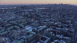 4.8K aerial stock footage of Columbia University, reveal Midtown Manhattan skyline in winter, New York City, twilight Aerial Stock Footage | AX66_0291