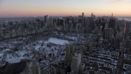 4.8K aerial stock footage wide view of Central Park and Midtown Manhattan in winter, New York City, twilight Aerial Stock Footage | AX66_0305