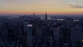 4.8K aerial stock footage of a wide view of Midtown skyscrapers in winter, New York City, twilight Aerial Stock Footage | AX66_0309E