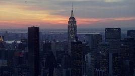 4.8K aerial stock footage of Chrysler and Empire State Building in Midtown, winter, New York City, twilight Aerial Stock Footage | AX66_0320E