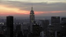 4.8K aerial stock footage fly toward Chrysler and Empire State Building in winter, New York City, twilight Aerial Stock Footage | AX66_0322