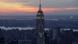 4.8K aerial stock footage of approaching Chrysler Building and Empire State Building in winter, New York City, twilight Aerial Stock Footage | AX66_0324