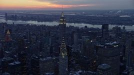 4.8K aerial stock footage of the Chrysler Building and Empire State Building in winter, New York City, twilight Aerial Stock Footage | AX66_0325E