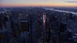 4.8K aerial stock footage approach Times Square and Midtown Manhattan in winter, New York City, twilight Aerial Stock Footage | AX66_0334E