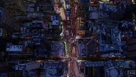 4.8K aerial stock footage tilt to a bird's eye view of Times Square in winter, New York City, twilight Aerial Stock Footage | AX66_0337E