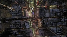 4.8K aerial stock footage of a bird's eye view of Times Square in winter, New York City, twilight Aerial Stock Footage | AX66_0340
