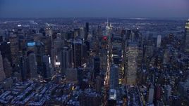4.8K aerial stock footage of Midtown Manhattan skyscrapers in winter, New York City, twilight Aerial Stock Footage | AX66_0344E
