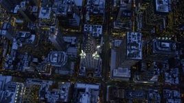 4.8K aerial stock footage approach the Chrysler Building in snow, New York City, twilight Aerial Stock Footage | AX66_0350E