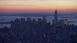 4.8K aerial stock footage of Lower Manhattan skyscrapers in winter, New York City, twilight Aerial Stock Footage | AX66_0352E