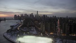 4.8K aerial stock footage of Lower East Side and Lower Manhattan skyline in winter, New York City, twilight Aerial Stock Footage | AX66_0361