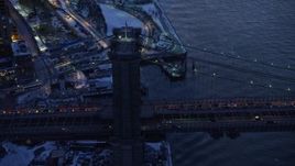 4.8K aerial stock footage of approaching the Brooklyn Bridge in winter, New York City, twilight Aerial Stock Footage | AX66_0369E