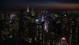 4.8K aerial stock footage of Midtown Manhattan skyscrapers, New York City, night Aerial Stock Footage | AX66_0431E