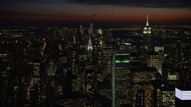 4.8K aerial stock footage of Empire State and Chrysler Buildings, and Lower Manhattan, New York City, night Aerial Stock Footage | AX66_0438E