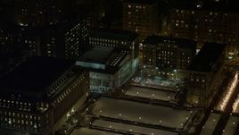 4.8K aerial stock footage view of fly over Columbia University to approach and orbit Lerner Hall at night, New York City, New York Aerial Stock Footage | AX67_0013