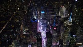 4.8K aerial stock footage view flyby Times Square and skyscrapers at night, Midtown Manhattan, New York City, New York Aerial Stock Footage | AX67_0040