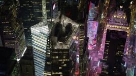4.8K aerial stock footage view of orbiting Bank of America Tower skyscraper at night, Midtown Manhattan, New York City, New York Aerial Stock Footage | AX67_0043