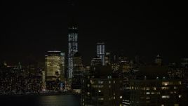 4.8K aerial stock footage view of World Trade Center and Freedom Tower at night, New York Aerial Stock Footage | AX67_0069