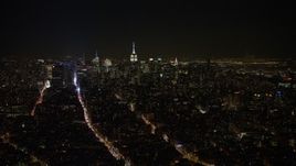 4.8K aerial stock footage view of a wide view of the Midtown skyline at night, New York Aerial Stock Footage | AX67_0092
