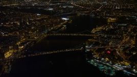 4.8K aerial stock footage view of approaching Brooklyn Bridge, Manhattan Bridge at night, New York Aerial Stock Footage | AX67_0096