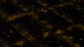 4.8K aerial stock footage view of flying by residential neighborhoods in Queens at night, New York Aerial Stock Footage | AX67_0111