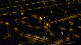 4.8K aerial stock footage view of a bird's eye view of residential neighborhoods in Queens at night, New York Aerial Stock Footage | AX67_0114