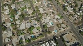 4.8K aerial stock footage bird's eye view of suburban homes, revealing I-5 and street intersection in Sun Valley, California Aerial Stock Footage | AX68_002