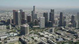 4.8K aerial stock footage tilt from Belmont High School to reveal Downtown Los Angeles, California Aerial Stock Footage | AX68_012