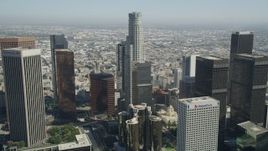 4.8K aerial stock footage tilt from office building to reveal and approach US Bank Tower in Downtown Los Angeles, California Aerial Stock Footage | AX68_013