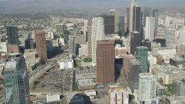 4.8K aerial stock footage tilt from Staples Center to reveal and approach Downtown Los Angeles towers, California Aerial Stock Footage | AX68_021