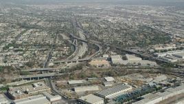 4.8K aerial stock footage approach East Los Angeles Interchange in Boyle Heights, Los Angeles, California Aerial Stock Footage | AX68_027
